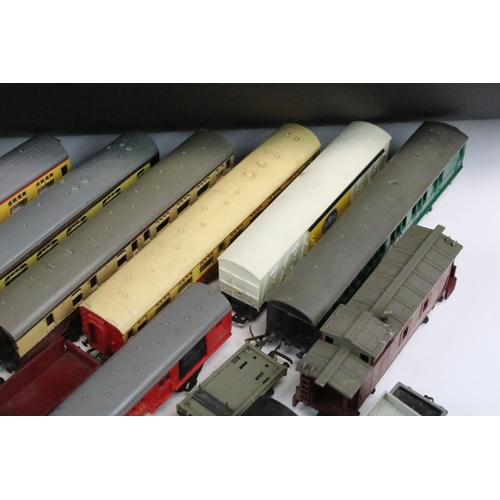 42 - Around 50 OO gauge items of rolling stock to include Triang, Hornby etc featuring coaches, wagons, v... 