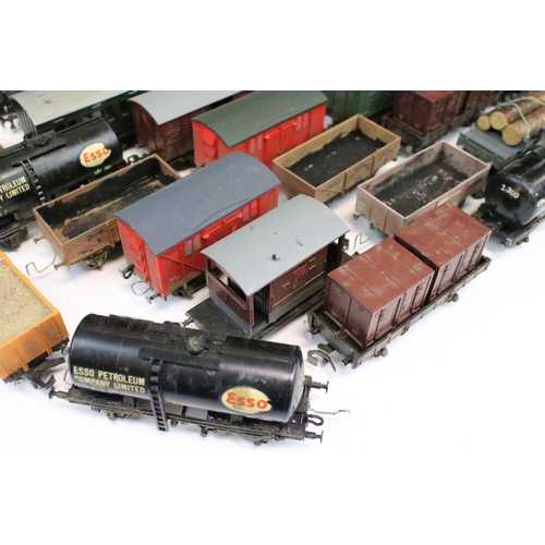 43 - Over 50 OO gauge items of rolling stock to include wagons, coaches and vans featuring mainly kit bui... 