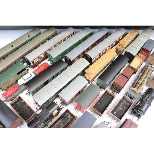 43 - Over 50 OO gauge items of rolling stock to include wagons, coaches and vans featuring mainly kit bui... 