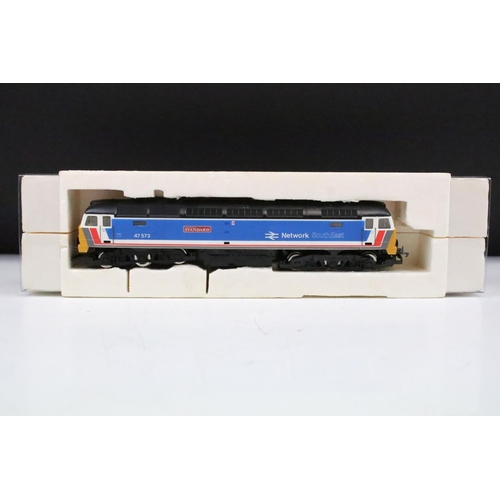 74 - Three boxed Hornby OO gauge locomotives to include Evening Standard BR Network South East, R877 BR B... 