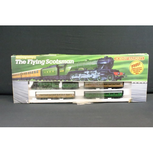 79 - Two boxed Hornby OO gauge electric train sets to include R778 The Flying Scotsman and R700 Depot Die... 