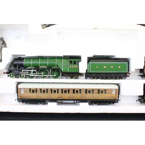 79 - Two boxed Hornby OO gauge electric train sets to include R778 The Flying Scotsman and R700 Depot Die... 