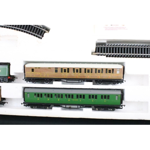 79 - Two boxed Hornby OO gauge electric train sets to include R778 The Flying Scotsman and R700 Depot Die... 