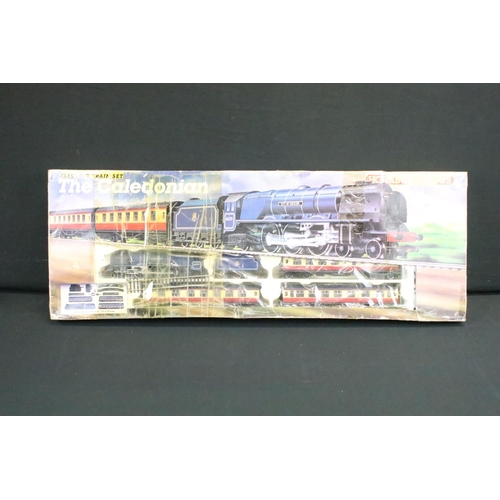 87 - Two boxed Hornby OO gauge electric train sets to include R1048 The Western Pullman and R775 The Cale... 