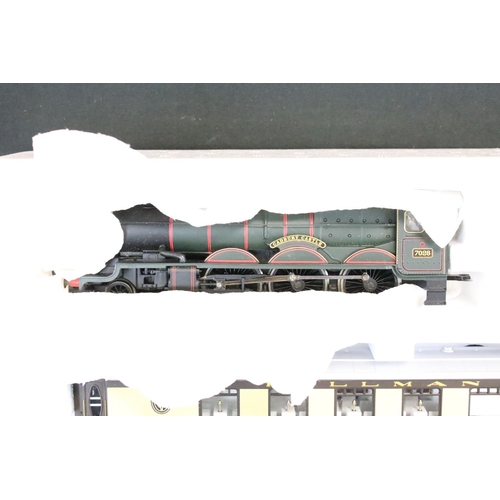 87 - Two boxed Hornby OO gauge electric train sets to include R1048 The Western Pullman and R775 The Cale... 