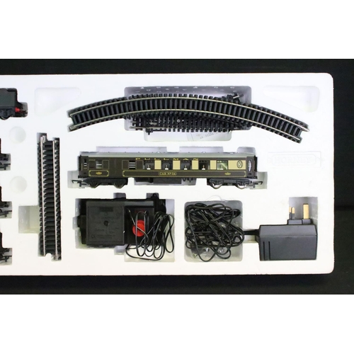 87 - Two boxed Hornby OO gauge electric train sets to include R1048 The Western Pullman and R775 The Cale... 