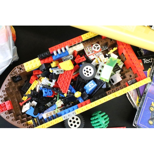 377 - Lego - A large quantity of various Lego bricks and accessories, featuring mini figures, a part-built... 