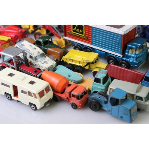 1301 - Large collection of play worn mid 20th C diecast models to include Dinky, Matchbox and Corgi etc  fe... 