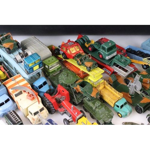 1301 - Large collection of play worn mid 20th C diecast models to include Dinky, Matchbox and Corgi etc  fe... 