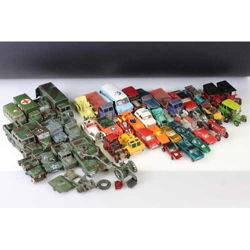 1302 - Quantity of mid 20th C play worn diecast models to include Corgi, Dinky, Matchbox featuring military... 