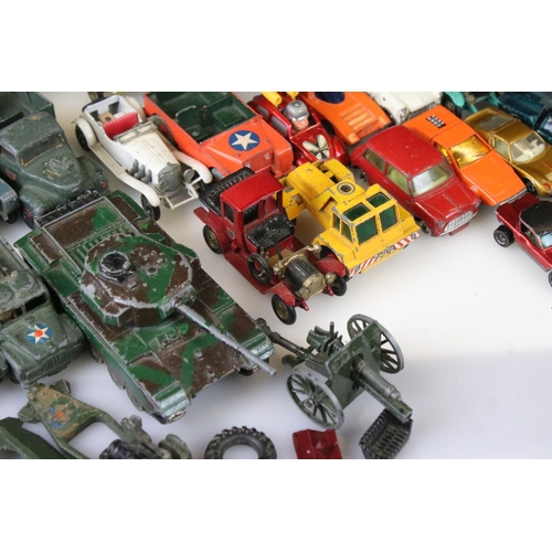 1302 - Quantity of mid 20th C play worn diecast models to include Corgi, Dinky, Matchbox featuring military... 