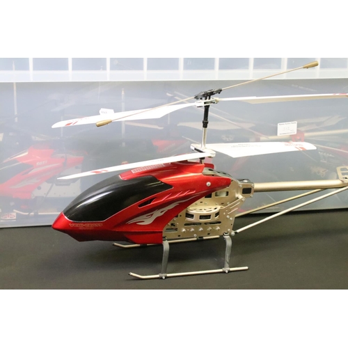 312 - Radio Control - A collection of ten R/C helicopters to include Vehi-Cross Grand, Scud Model Helicopt... 