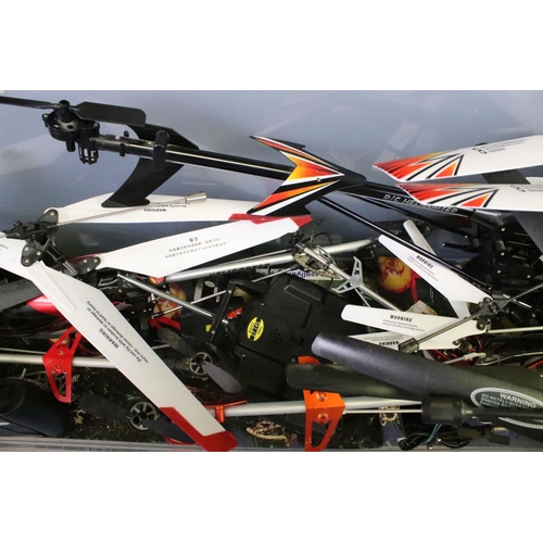 312 - Radio Control - A collection of ten R/C helicopters to include Vehi-Cross Grand, Scud Model Helicopt... 