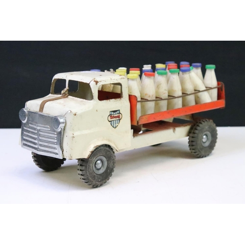 418 - Two tinplate models to include a Triang milk delivery truck with 27 plastic milk bottles with red, g... 