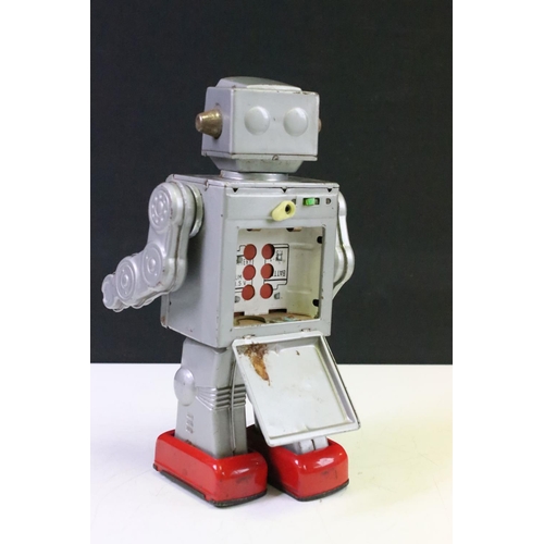 423 - Mid 20th C tin plate metal battery powered robot, unmarked, showing some paint wear and scratches