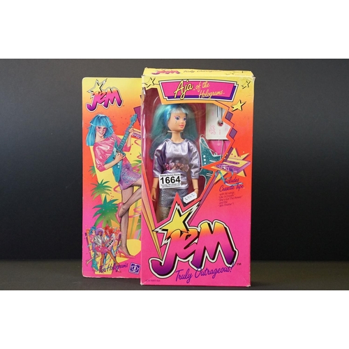 1664 - Boxed Hasbro Jem Aja of the Holograms figure complete with accessories, box a little tatty but gd ov... 