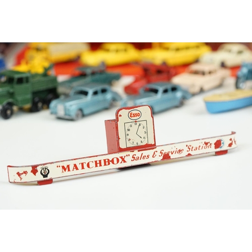 1314 - Around 35 mid 20th C play worn Matchbox Lesney 75 Series diecast models to include road and commerci... 