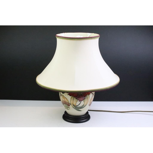 20 - Moorcroft 'Anna Lily' pattern table lamp, of baluster form, designed by Nicola Slaney, with shade. (... 