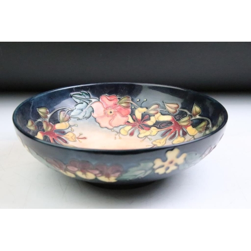 23 - Moorcroft 'Honeysuckle' pattern circular fruit bowl, impressed & painted marks to base, date mark fo... 