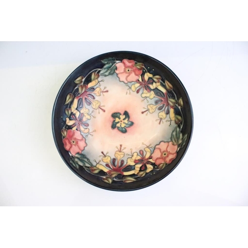 23 - Moorcroft 'Honeysuckle' pattern circular fruit bowl, impressed & painted marks to base, date mark fo... 