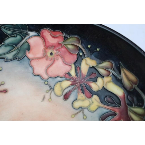 23 - Moorcroft 'Honeysuckle' pattern circular fruit bowl, impressed & painted marks to base, date mark fo... 