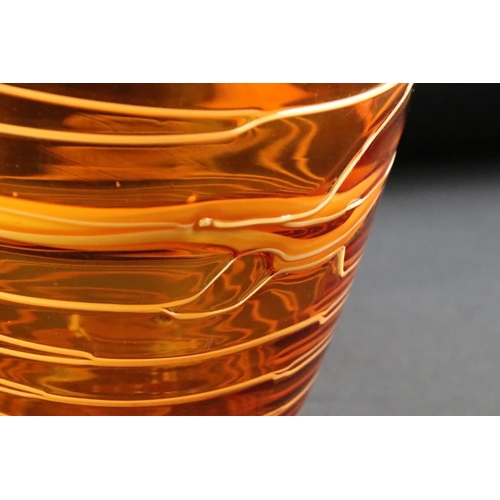 30 - Amber studio art glass vase of tapering form, with spiralling 'thread' decoration, ground pontil to ... 