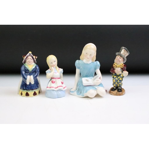 57 - Four Alice In Wonderland porcelain figures to include Royal Worcester Alice candle snuffer, modelled... 