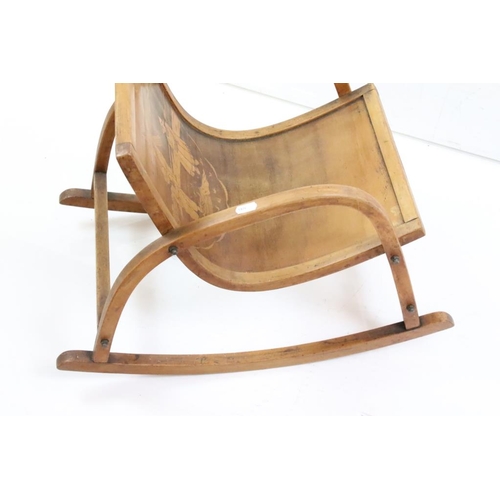 650 - Mid century Bentwood Child’s Rocking Chair decorated with a Dutch Boy and Girl, 36cm wide x 44cm hig... 