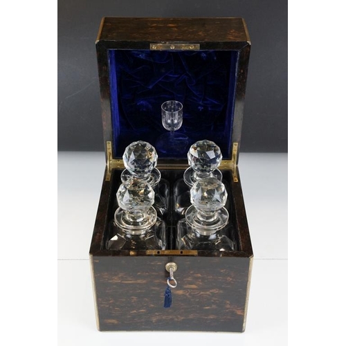 203 - 19th Century Victorian coromandel wood decanter box housing four decanter bottle with faceted stoppe... 