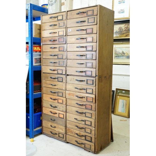 582 - Pine Tall Chest of Thirty Four Drawers, formerly from a Hardware Shop, 92cm wide x 35cm deep x 167cm... 