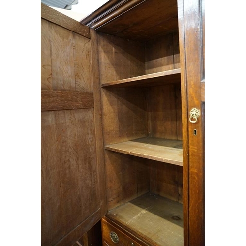 652 - Early 19th century Oak House-keeper’s Cupboard, the upper section with three panel doors opening to ... 
