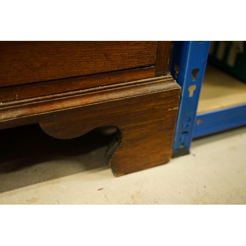 652 - Early 19th century Oak House-keeper’s Cupboard, the upper section with three panel doors opening to ... 