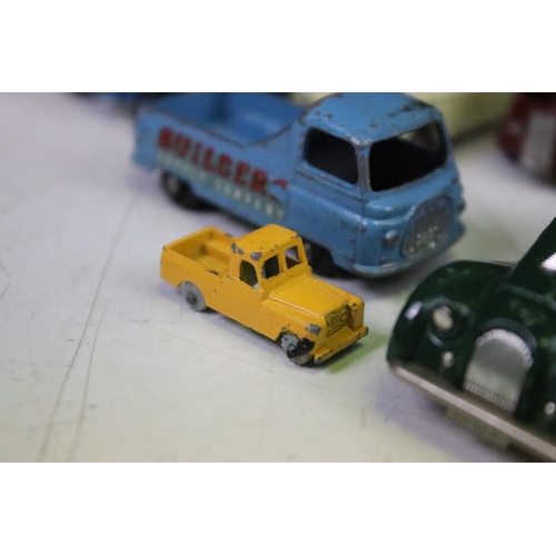 1465 - Around 60 mid 20th C onwards play worn diecast models, mostly Matchbox Lesney examples, also featuri... 