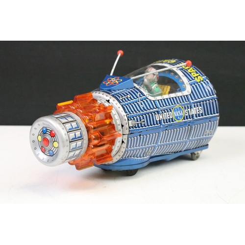 444 - Boxed S.H. Horikawa Japanese Space Capsule battery operated tinplate model, circa 1960s, with seated... 