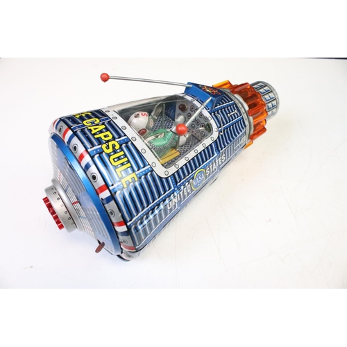 444 - Boxed S.H. Horikawa Japanese Space Capsule battery operated tinplate model, circa 1960s, with seated... 