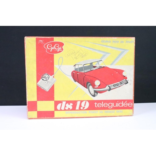 451 - Boxed GeGe Citroen DS 19 Teleguidee 'Grand Prix Du Jouet' battery-operated remote control car, circa... 