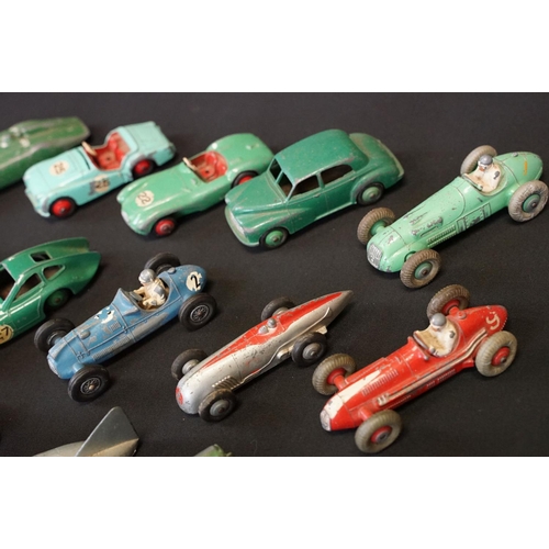 1409 - 25 Mid 20th C play worn Dinky diecast models to include 110 Aston Martin, 108 MG Midget, 111 Triumph... 