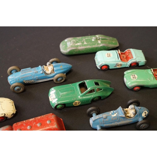 1409 - 25 Mid 20th C play worn Dinky diecast models to include 110 Aston Martin, 108 MG Midget, 111 Triumph... 