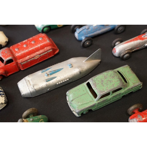 1409 - 25 Mid 20th C play worn Dinky diecast models to include 110 Aston Martin, 108 MG Midget, 111 Triumph... 