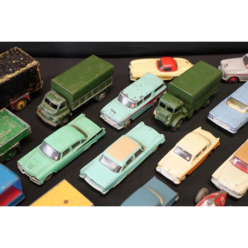 1410 - Around 85 mid 20th C play worn diecast models to include Dinky & Corgi featuring Corgi Karrier Banta... 