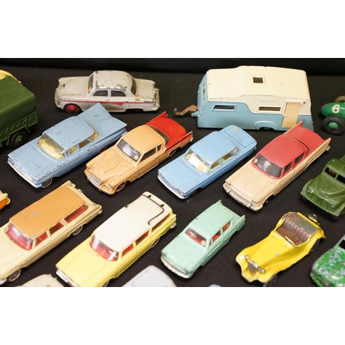 1410 - Around 85 mid 20th C play worn diecast models to include Dinky & Corgi featuring Corgi Karrier Banta... 