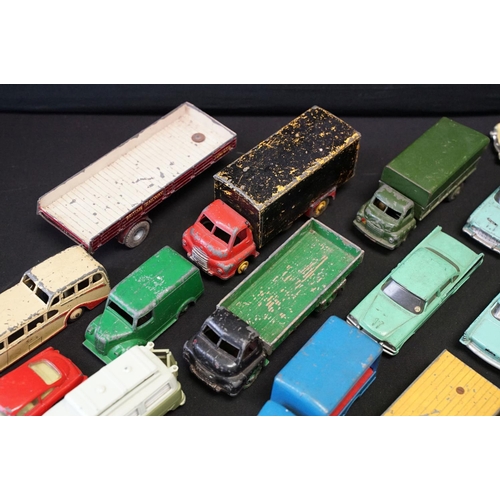 1410 - Around 85 mid 20th C play worn diecast models to include Dinky & Corgi featuring Corgi Karrier Banta... 