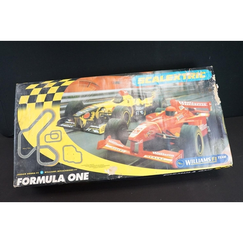 416 - Collection of mixed boxed and unboxed toys and games to include boxed Scalextric Formula 1, boxed Sc... 