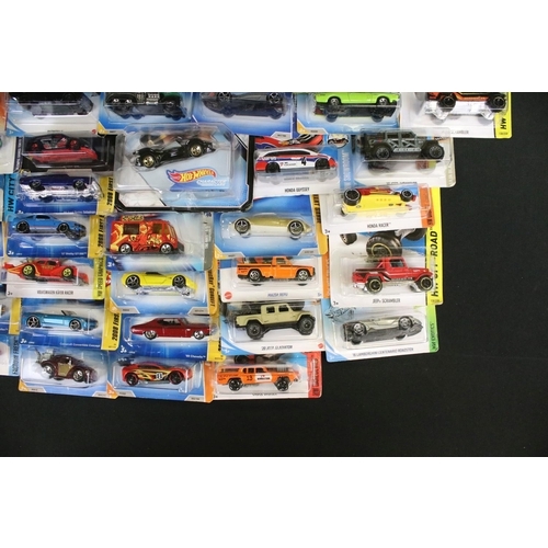 1084 - 65 Carded / boxed Mattel Hot Wheels diecast models featuring 2 x boxed Gotta Go 2, Batman, Avant Gar... 