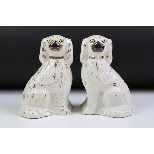 26 - Pair of 19th Century Victorian Staffordshire fire dogs, together with a Staffordshire poodle and a r... 