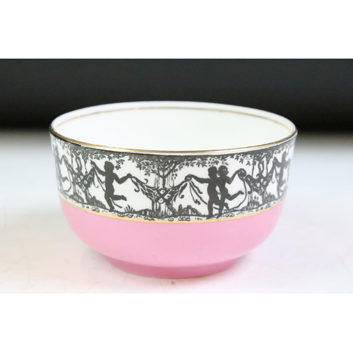 27 - Group Ye Olde English Grosvenor China ceramics having a pink ground with a black and gilt classical ... 