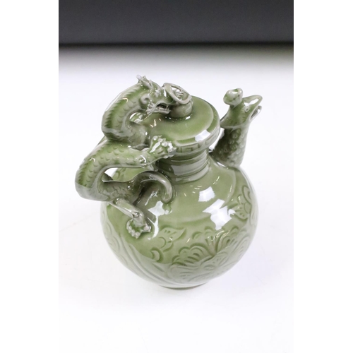 29 - Chinese Yue kiln style green glazed ornament / ewer having a moulded dragon handle with cockerel spo... 