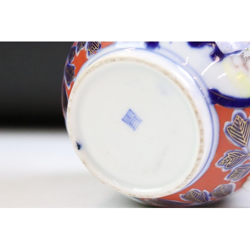 3 - 19th Century Chinese tea pot having a blue and white underglaze featuring pine tree panels and folia... 