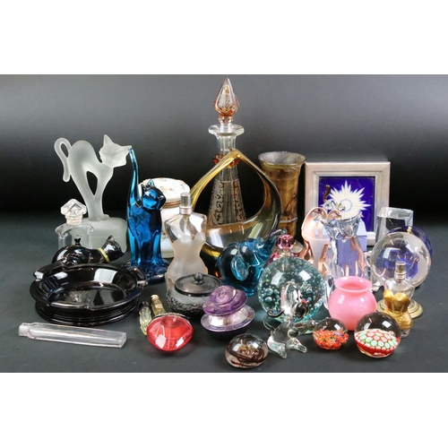 66 - Assorted glass to include a flash glass decanter, assorted perfume bottles, paperweights, Czech glas... 