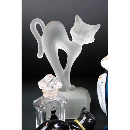 66 - Assorted glass to include a flash glass decanter, assorted perfume bottles, paperweights, Czech glas... 